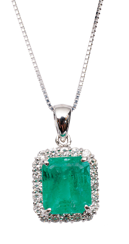 A fine emerald diamond pendant with necklace