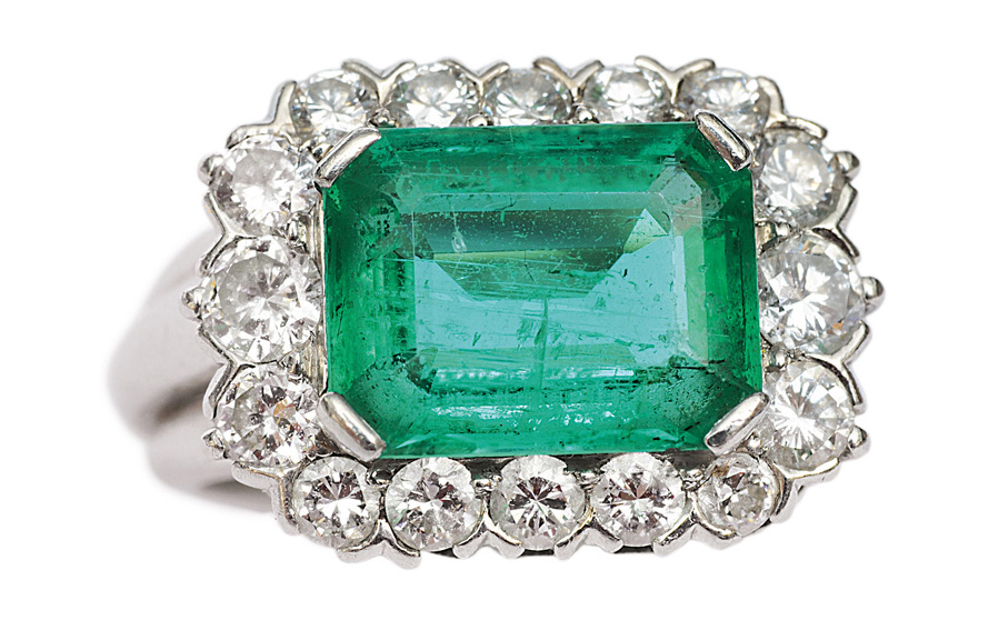 An emerald diamond ring