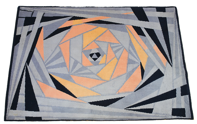An Art Deco carpet with geometric abstract decor