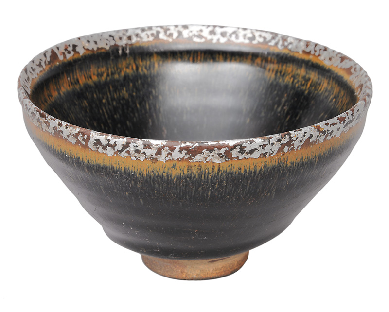 A tea bowl with fine glaze "hare"s fur" and silver rim