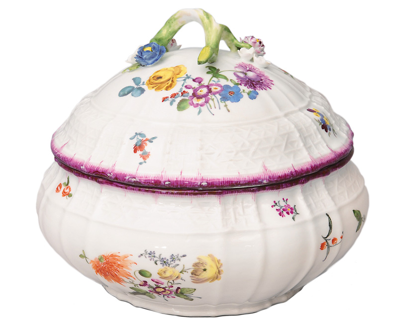 A tureen with cover and flower decoration