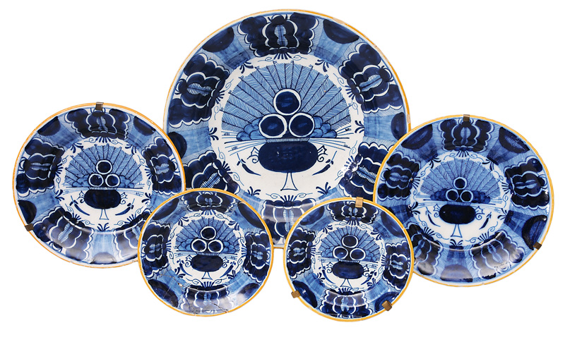 A set of 5 plates with peacock decor