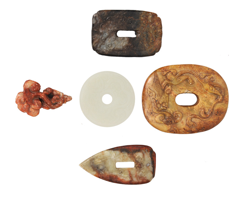 A set of 5 amulets and pendants