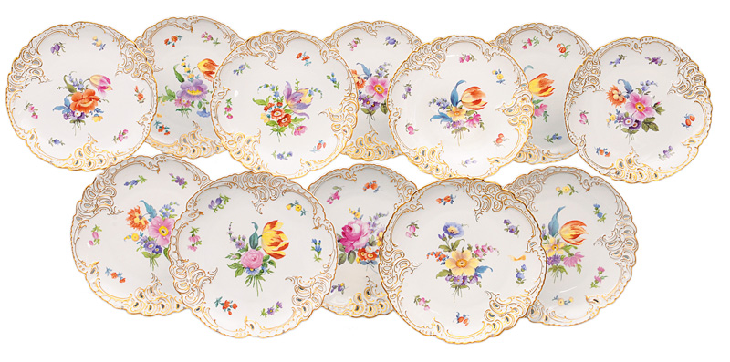 A set of 12 fretwork plates with bouquets and scattered flowers