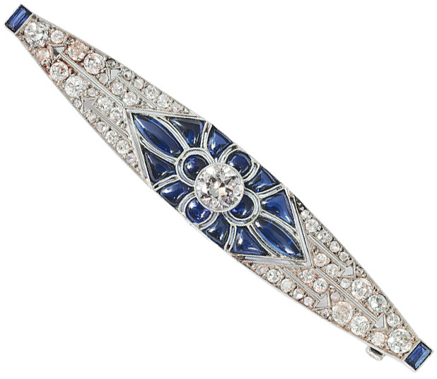 An Art-déco brooch with sapphires and diamonds