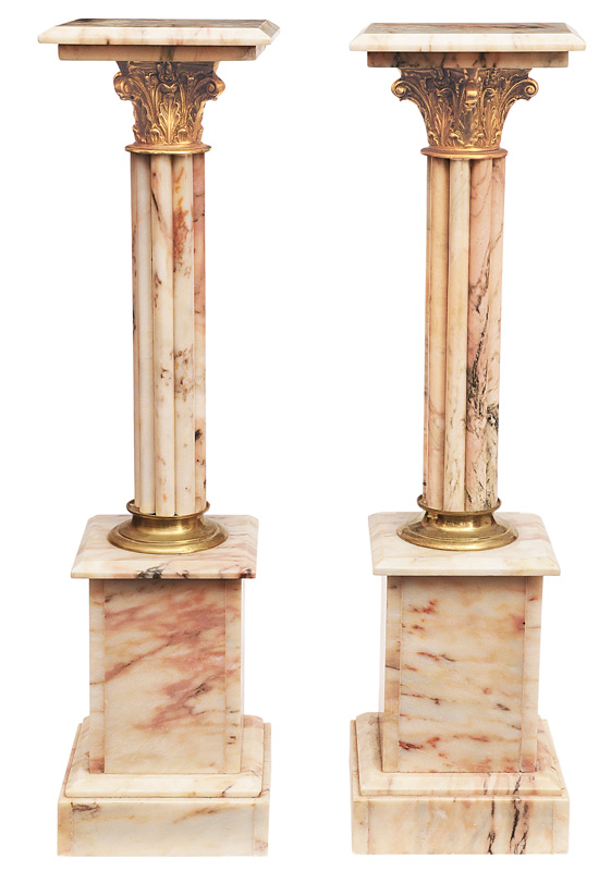 A pair of decorative marble columns