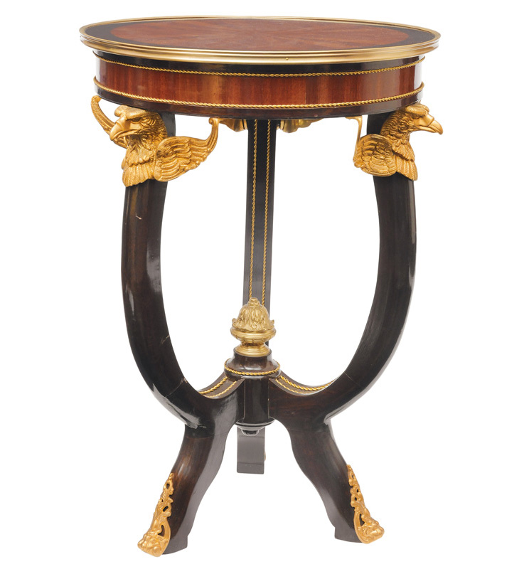 A round side table in the style of Empire