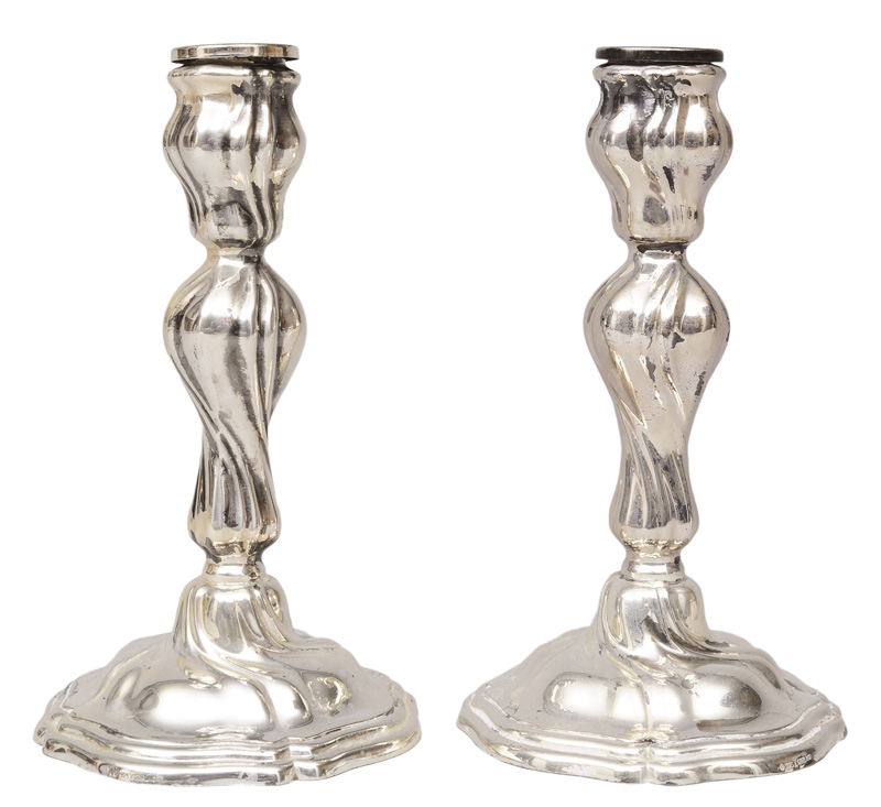 A pair of candle sticks in Rokoko style