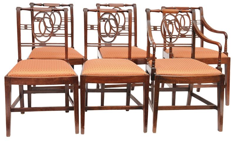 A set of 4 chairs with 2 arm chairs