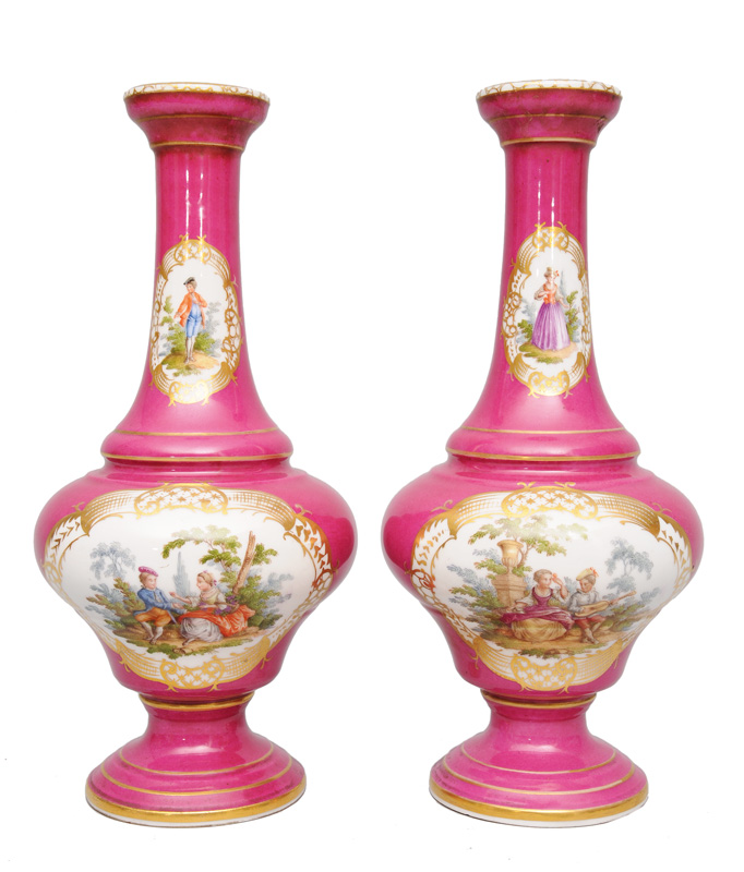 A pair of fuchsia-coloured vases with romantic scenes