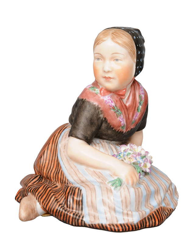 A figurine "Girl with flowers from the Faroe Islands"