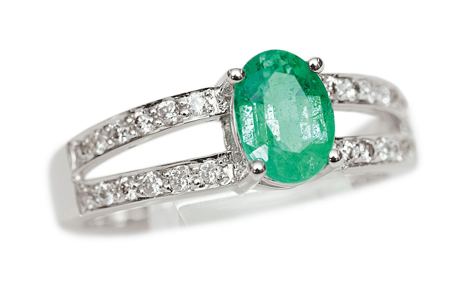 An emerald diamond ring