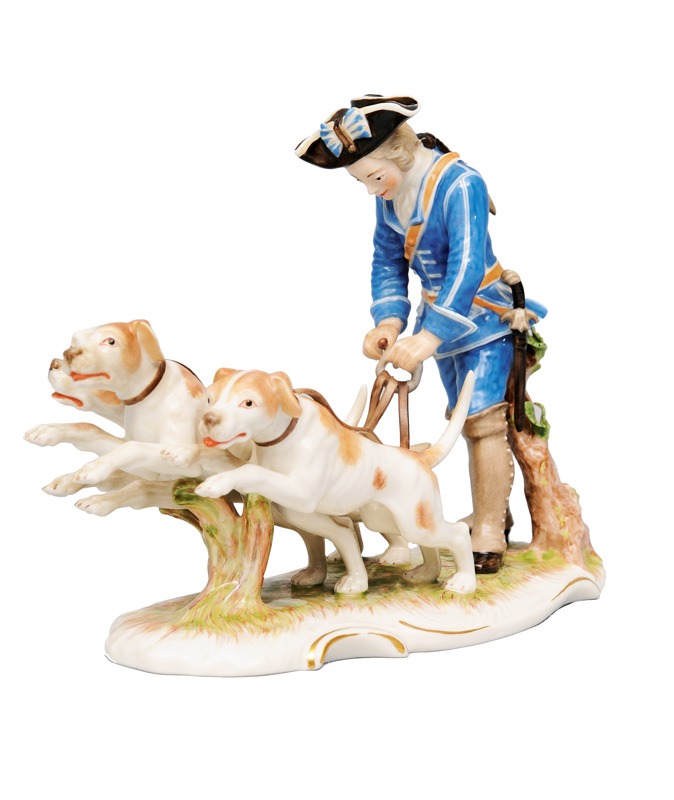 A figurine "Piqueur with 3 hunting dogs"