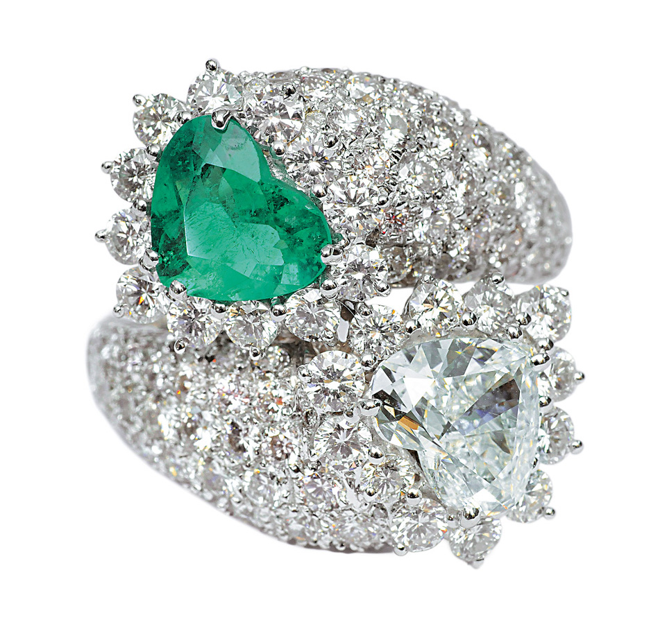 An extraordinary, high carat diamond emerald ring