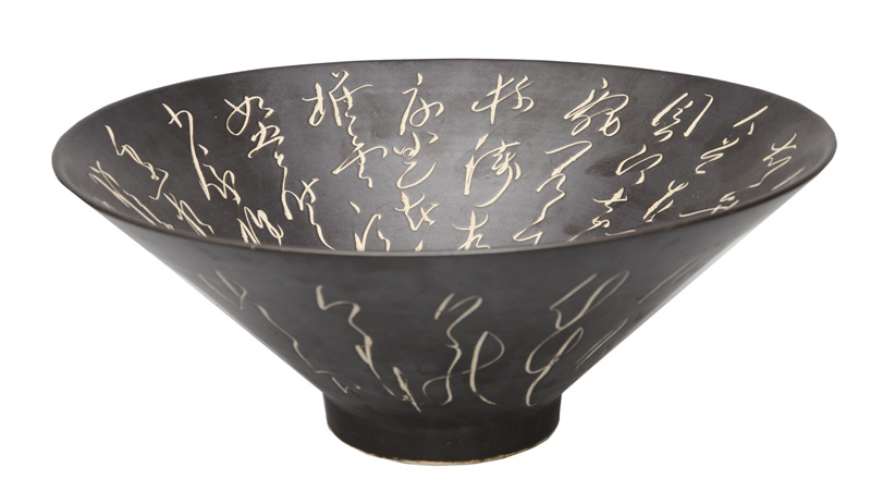 A bowl with grass script decoration