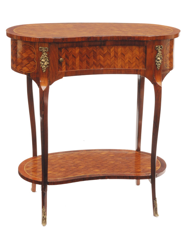 A Napoleon III table with rhombical marquetry