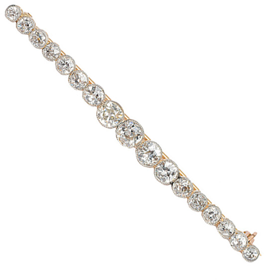 A needle brooch with diamonds