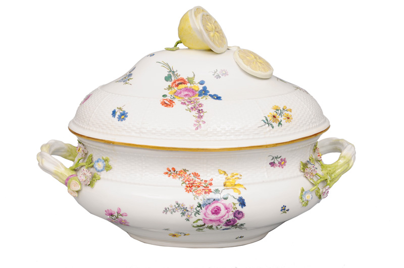 A large tureen with flower painting and lemon pommel