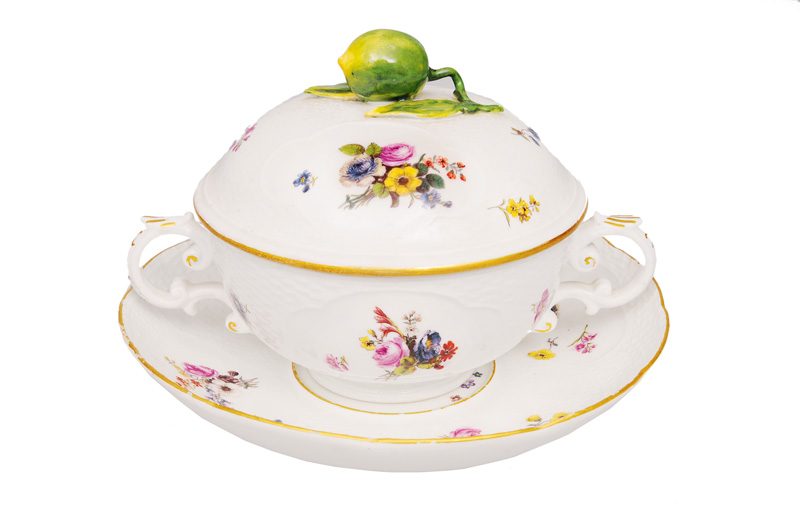 A small cover tureen with presentoir and flower painting