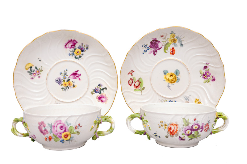 A pair of tureens on presentoir with flower painting