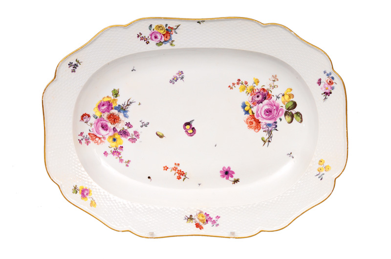 A large plate with flower painting