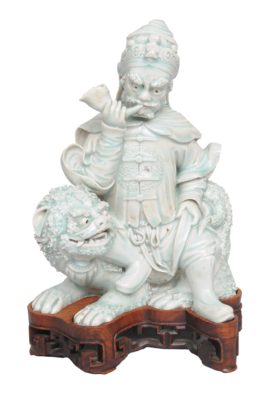 A rare celadon figurine "Guardian on a Fô-dog"