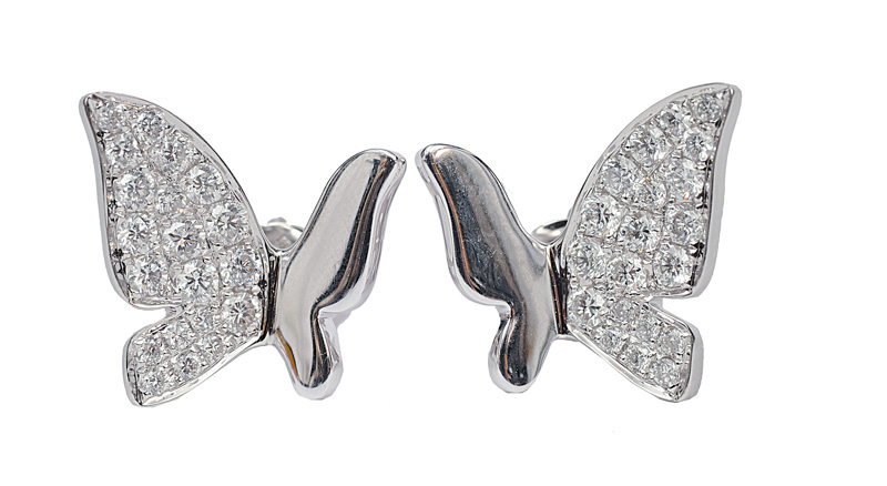 A pair of diamond earstuds in the shape of butterflies