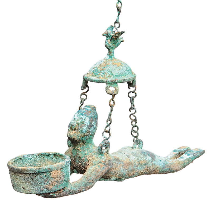 A rare figural bronze lamp