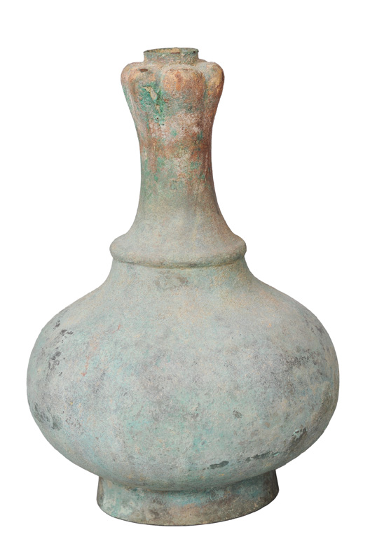A bronze bottle vase with garlic head