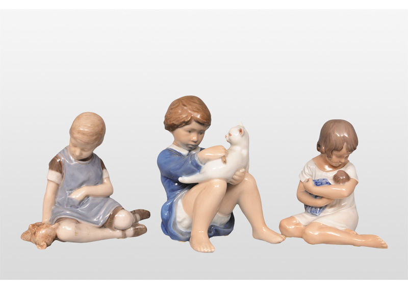 Three children figurines