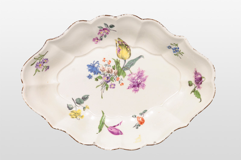 An oval bowl with flower painting