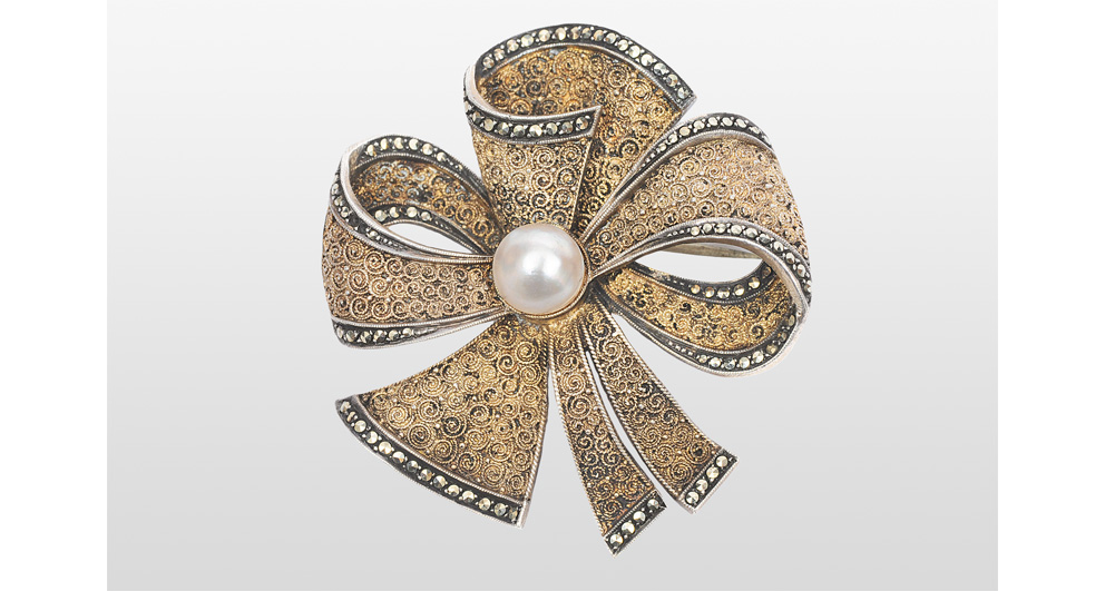 A brooch with a pearl by Theodor Fahrner