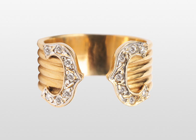 A golden ring with diamonds