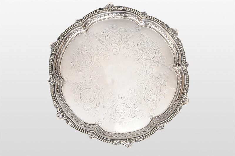 A salver with reliefed rim