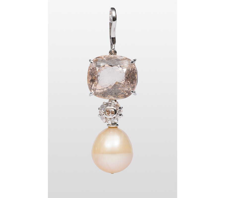 A morganite diamond pendant with large pearl