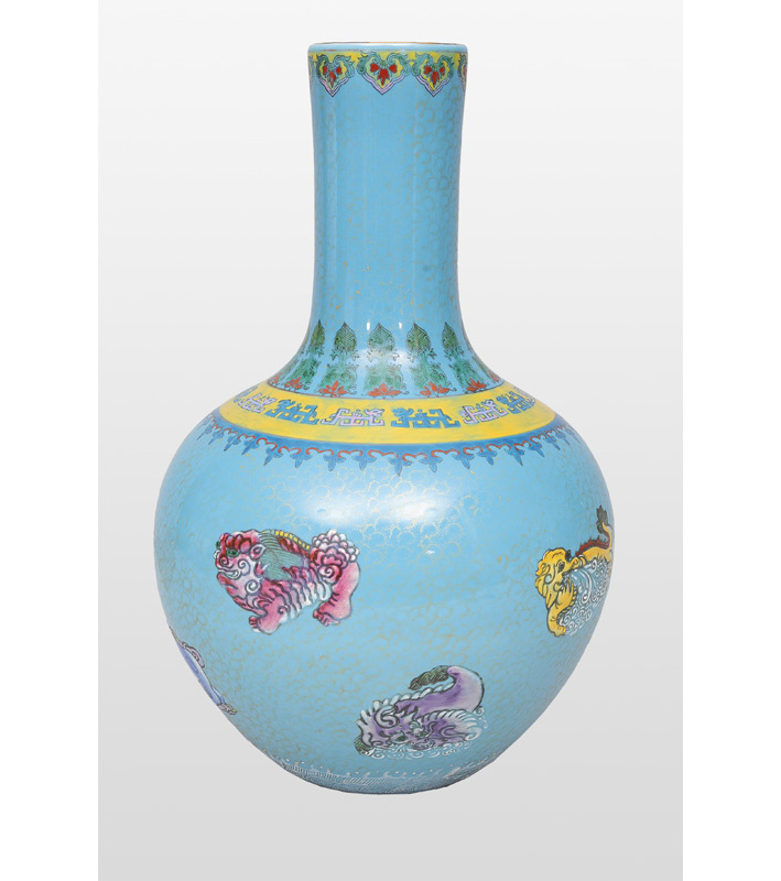 A bottle neck vase with mythical creatures