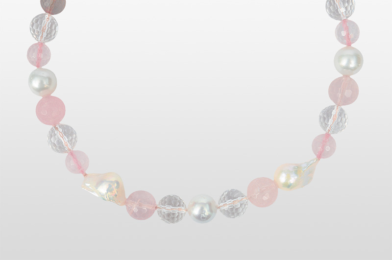 A necklace and two bracelets with rose quartz, pearls and rock crystal