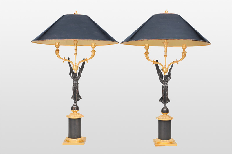 - A pair of girandole lamps with Victoria figures in the style of Empier A pair of girandole lamps with Victoria figures in the style of Empier