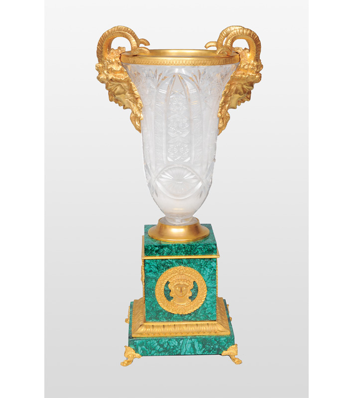 An extraordinary russian malachite vase with gilded ram head