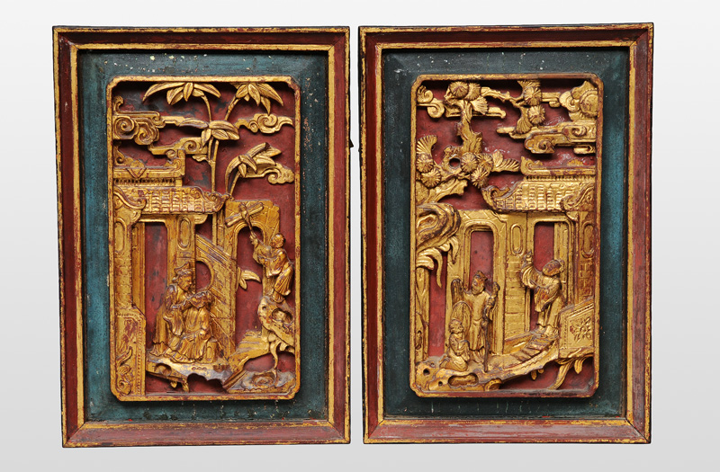 A pair of wall carvings with romantic scene