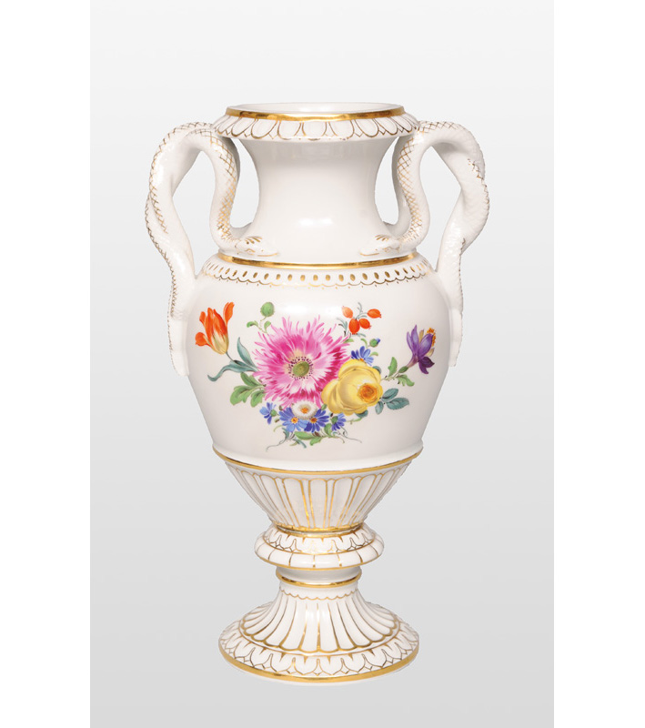 A vase with snake handles and flower painting