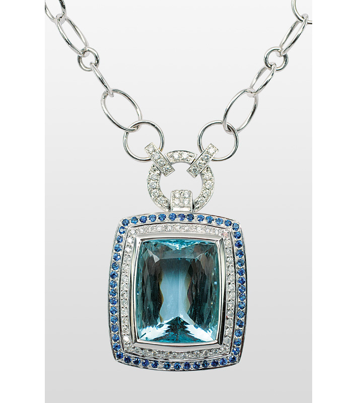 A large aquamarin diamond sapphire pendant with necklace