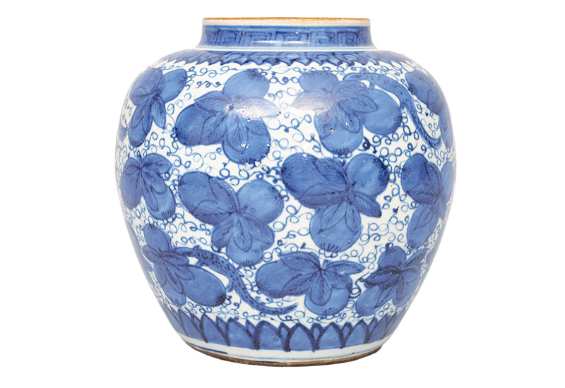 A globular vase with pomgranates A globular vase with pomgranates