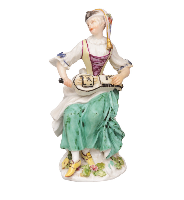 A rare figurine "Hurdy-gurdy woman"