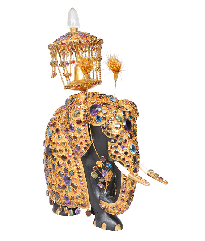 An magnicifent figurine of a jewel-embellished elephant
