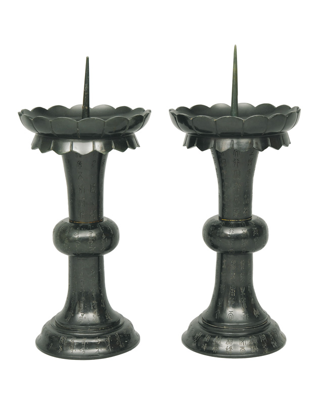 A pair of spinach green pricket candlesticks