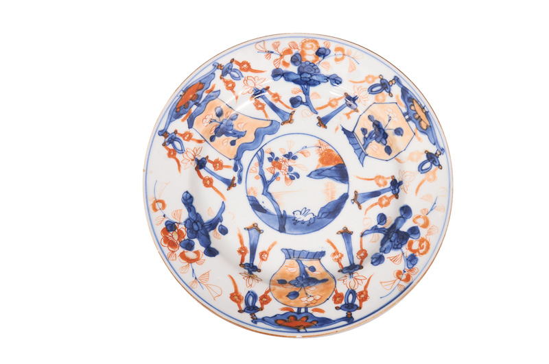 An Imari plate with lanters and hare