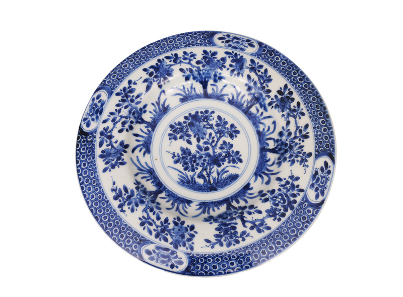 A plate with blossoming branches