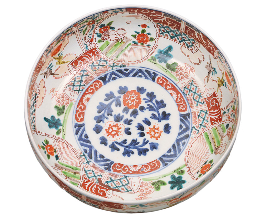 An Imari bowl with birds and shishis