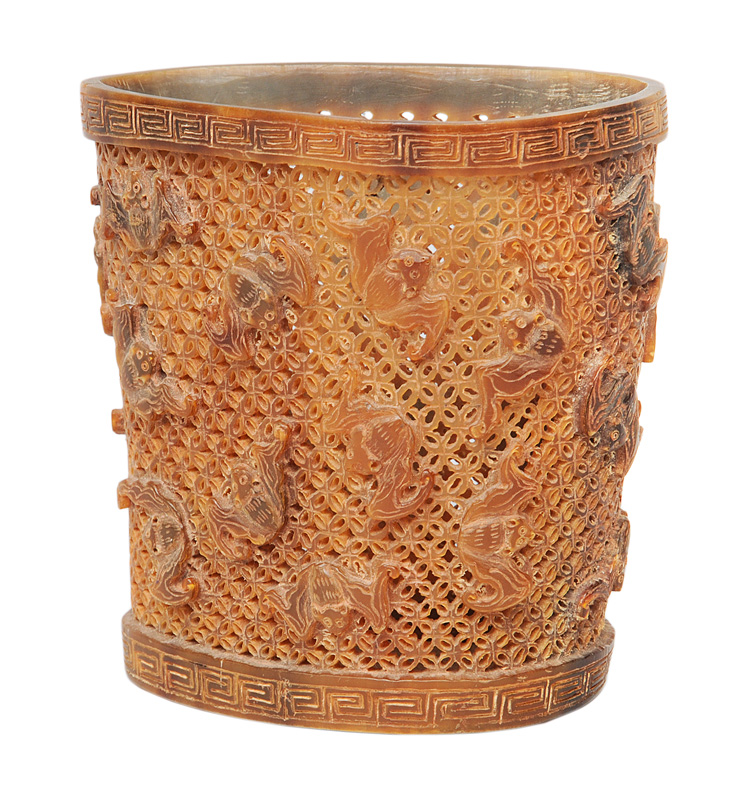 A horn brushpot with fine fretwork and bat decoration